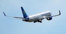 B767-31KER/W # G-TCCA leaves Manchester 03/07/2011.