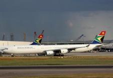 South African A340-642 # ZS-SNB @ LHR 11/06/2011.